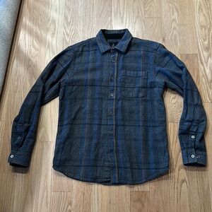 Dark grey, black, and blue plaid PRANA long sleeve button up shirt
